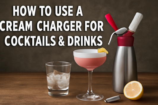 Learn how to use a cream charger to elevate your cocktails and drinks with smooth textures and bubbles. Featuring a pink cocktail and cocktail-making tools.